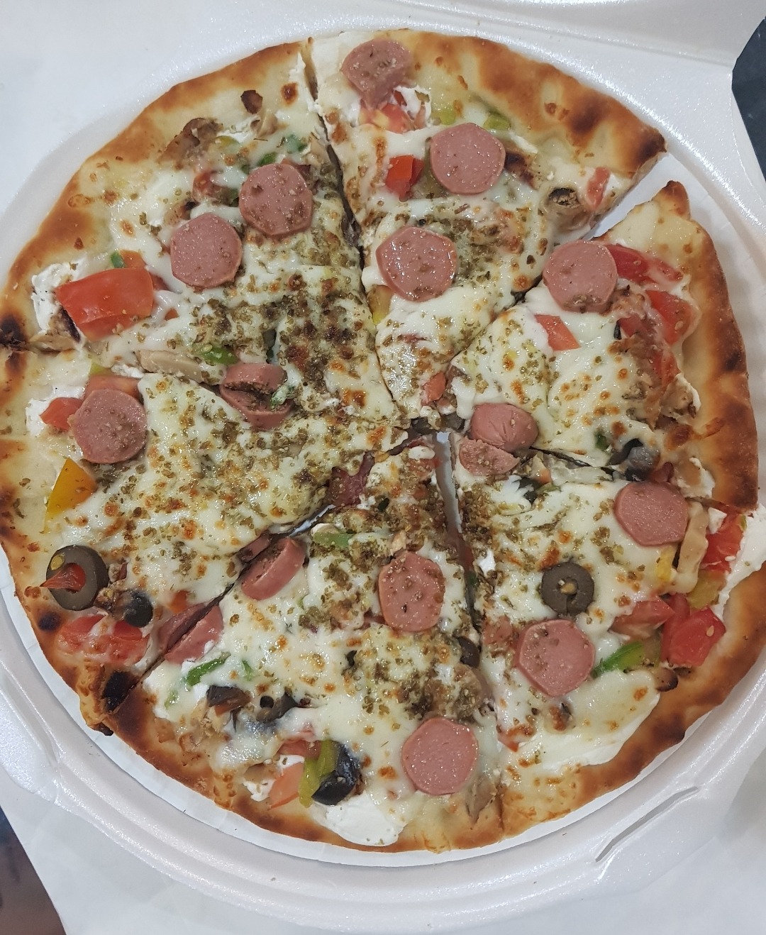 Naeem pizza with their specific flavour 👌 @ Al Naeem Grills - Bahrain