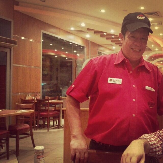 The most friendly waiter you can find in zinj pizza hut. Totally perfect behaviour. God bless him @ بيتزا هت - البحرين