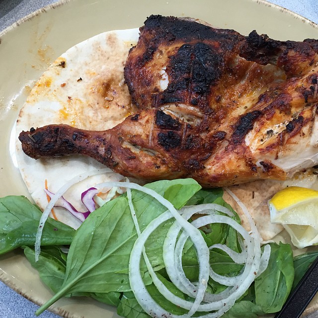 Half grilled chicken