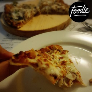 Pollo pizza: See how thin is the slice, full of yummy stuff till last bite 😋