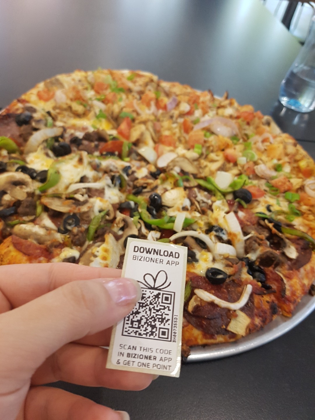 I've got 1 bizio point. 😀 . 
i more point and i will get a free pizza @ Round Table Pizza - Bahrain