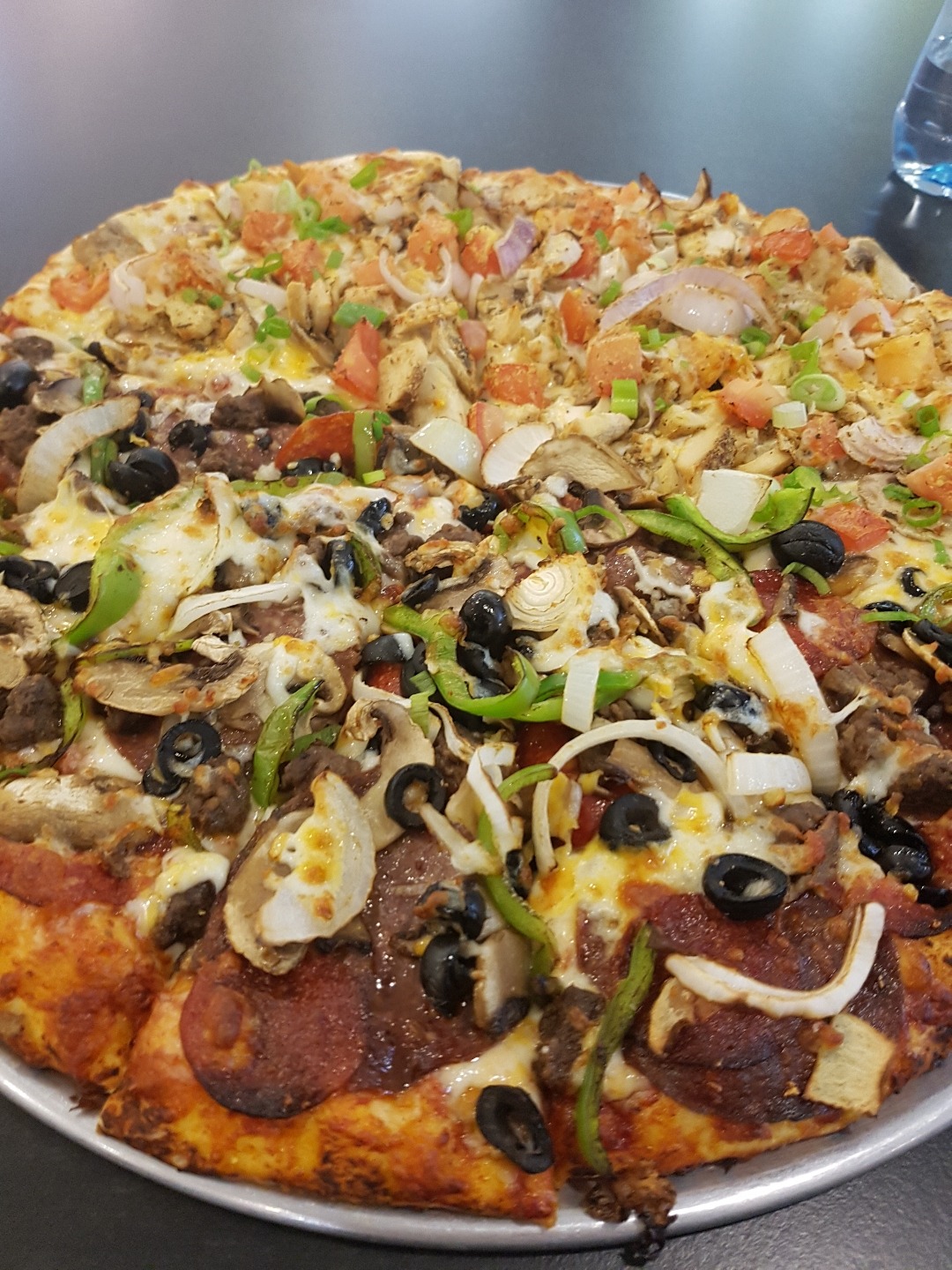 half meet half chicken. tasty @ Round Table Pizza - Bahrain