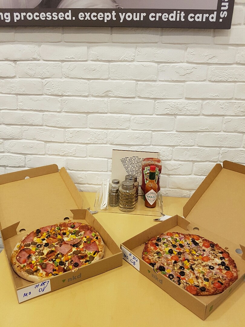 Grean house pizza and omnivore pizza @ NKD Pizza - Bahrain
